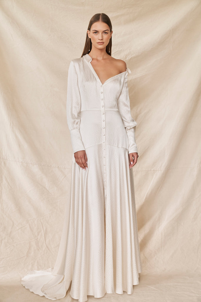 Woman wearing long sleeve silk wedding dress